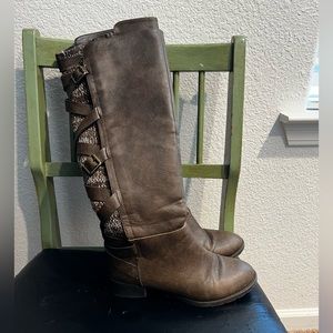 Woman’s tall brown boots